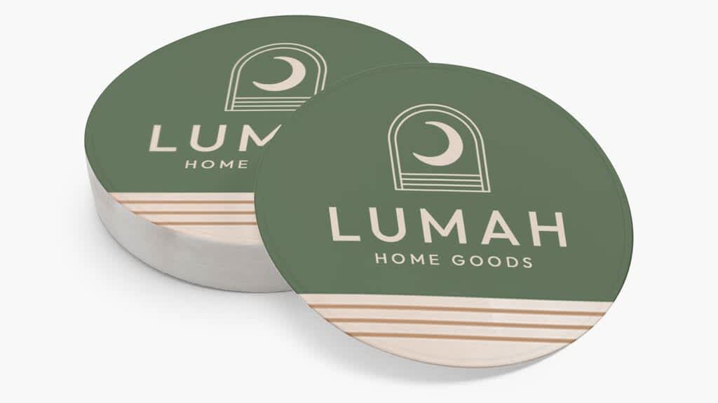 Earthy green and tan home goods brand logo on stickers