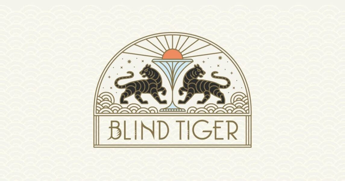 An elaborate logo design in art deco style for Blind Tiger, featuring two tigers and a martini glass