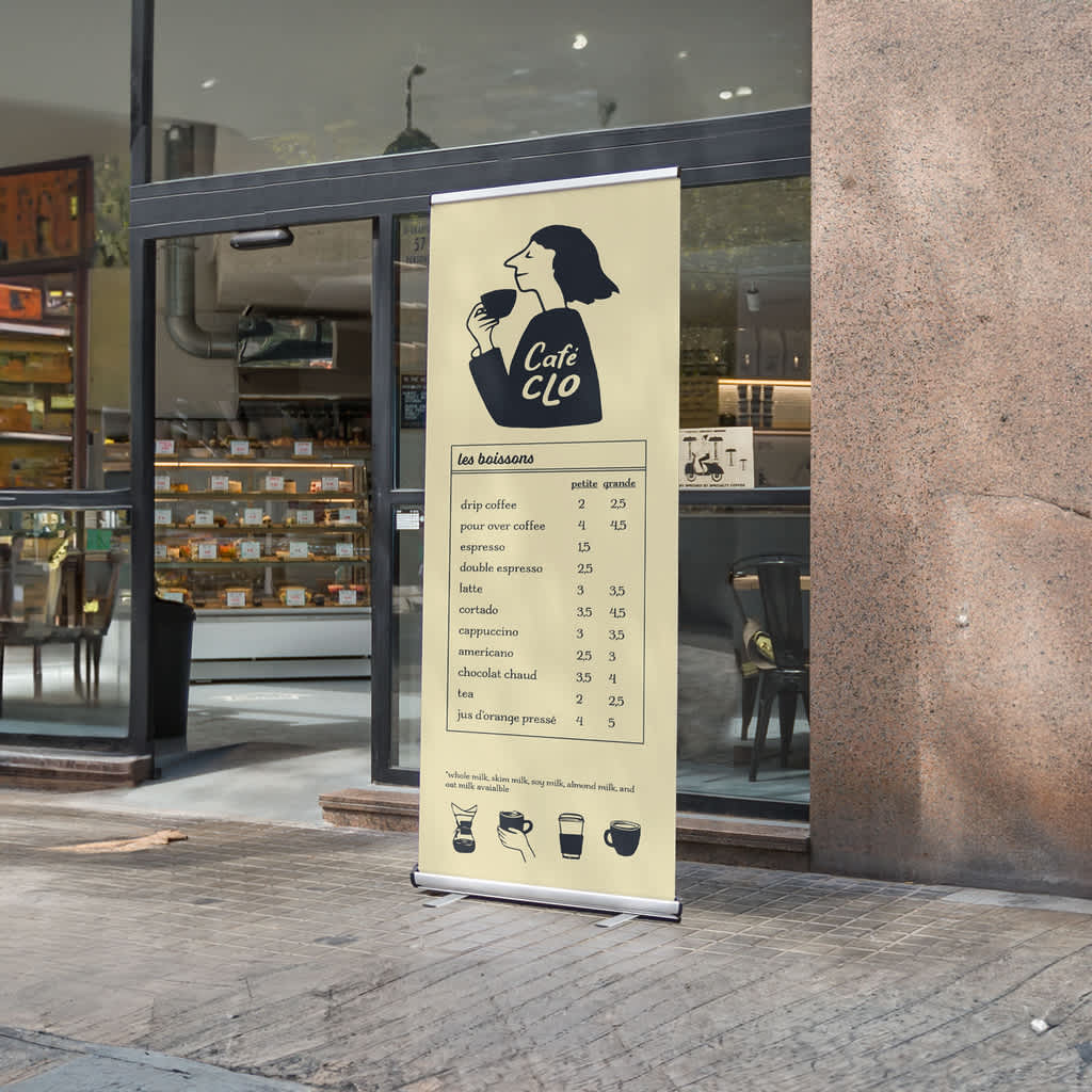 Retractable banner sign outside a cafe with a price list