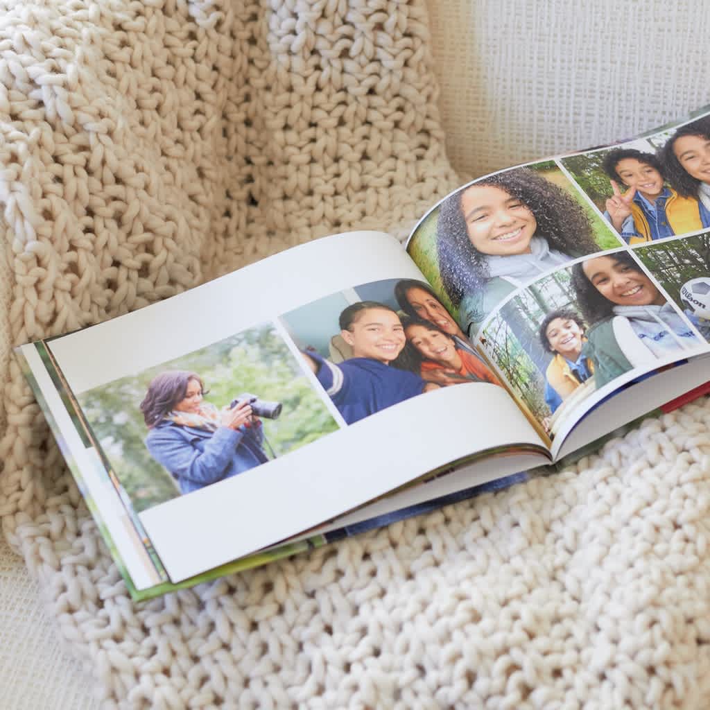 A family photo book design with a photo grid and plenty of white space
