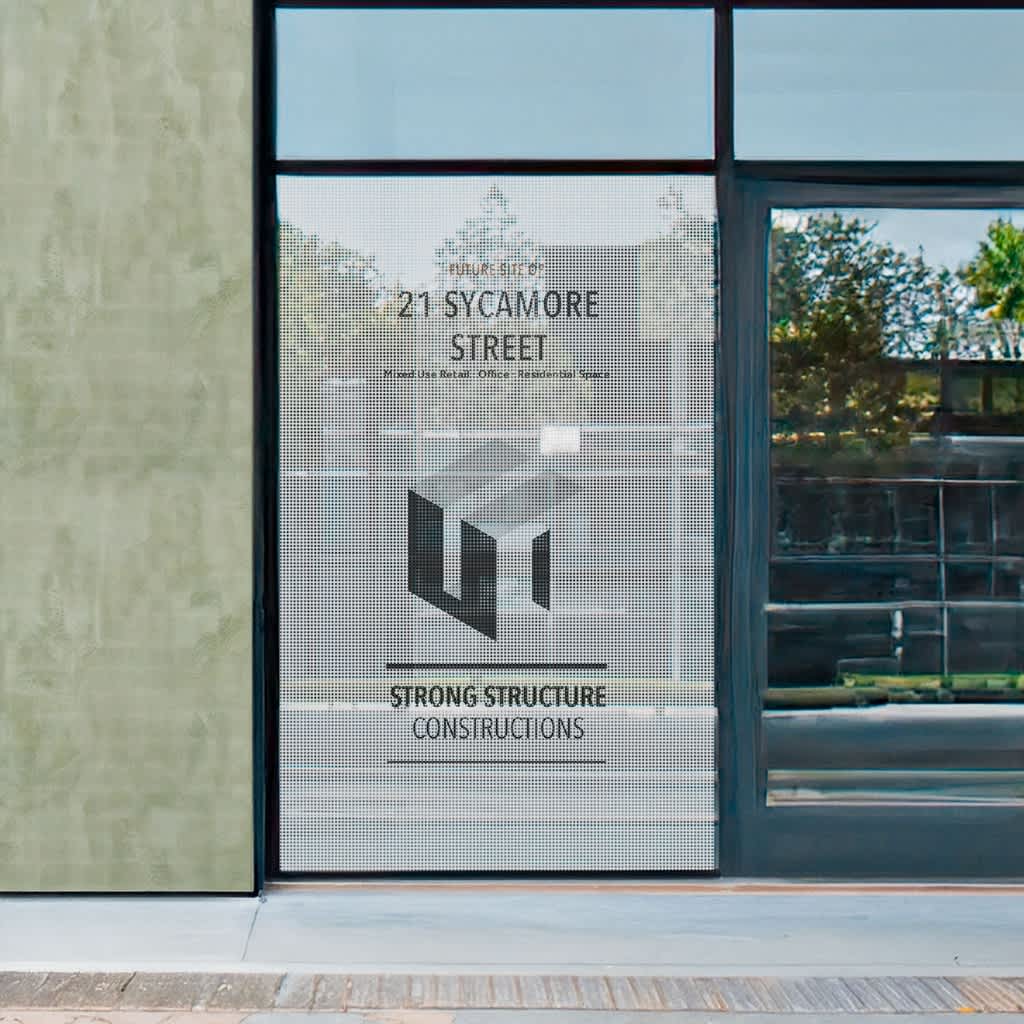 large window decal for construction company with logo and text