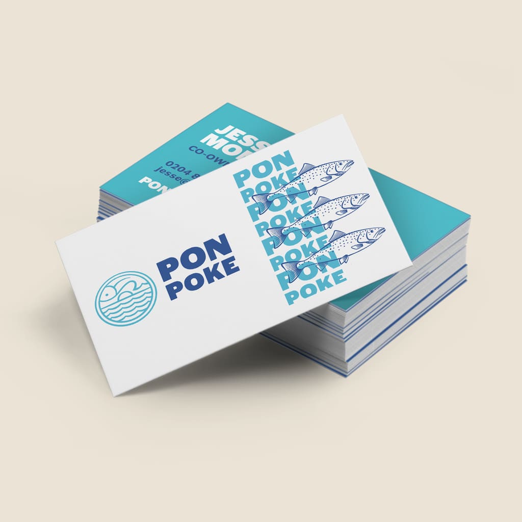 A stack of blue and white postcards with clear branding for a poke restaurant