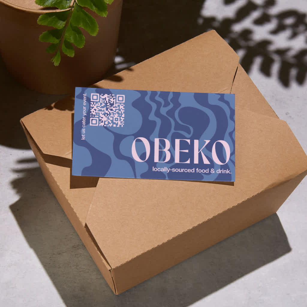 A blue business postcard with clear header and body copy fonts