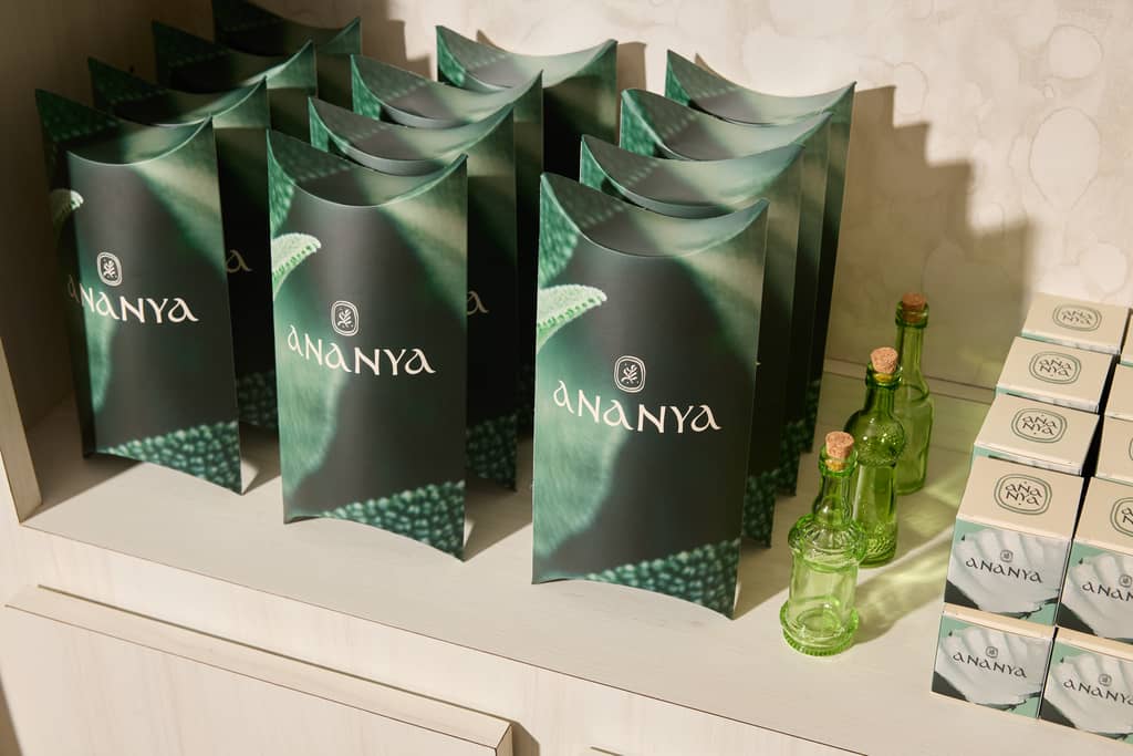 green branded product packaging on a shelf