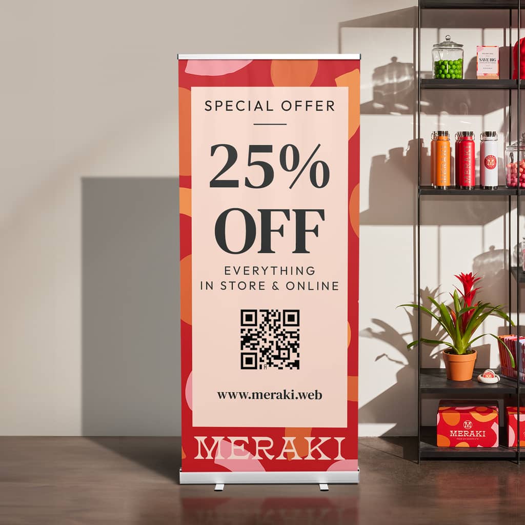 a red banner promoting a brand sale in bold black lettering