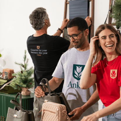 Custom branded apparel and printed shirts displayed in studio showing tshirt design ideas for small business merchandising