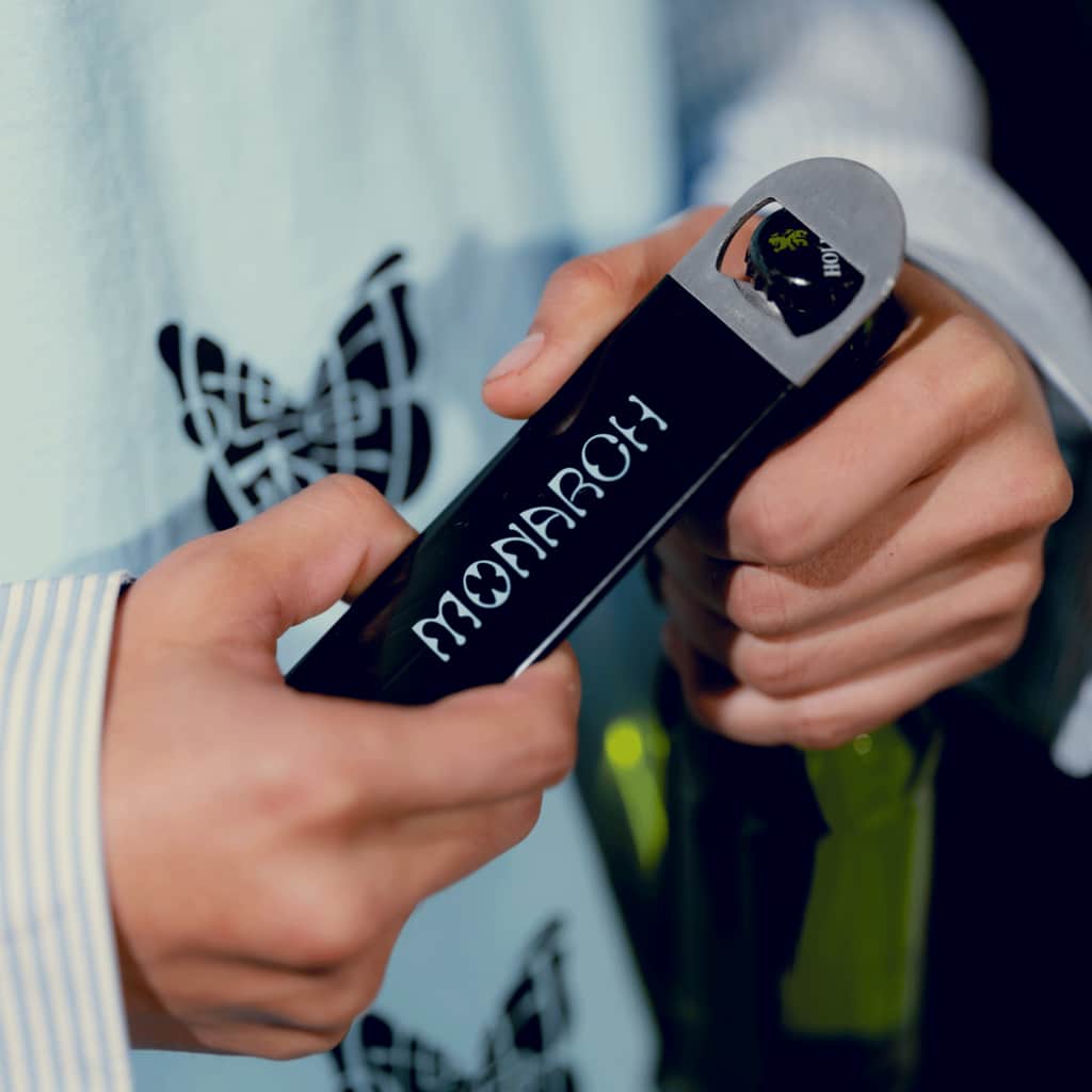 A branded bottle opener as high-quality merch to promote a brand