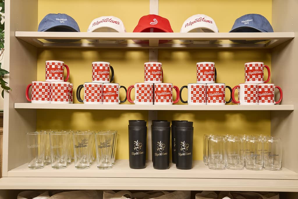 Caps, glasses and mugs: branded merch for an Italian restaurant