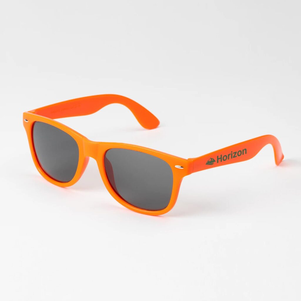 Orange sunglasses with the brand logo printed on the arms