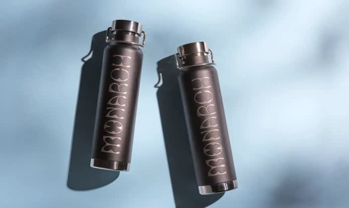 Sleek, black, monarch branded water bottles