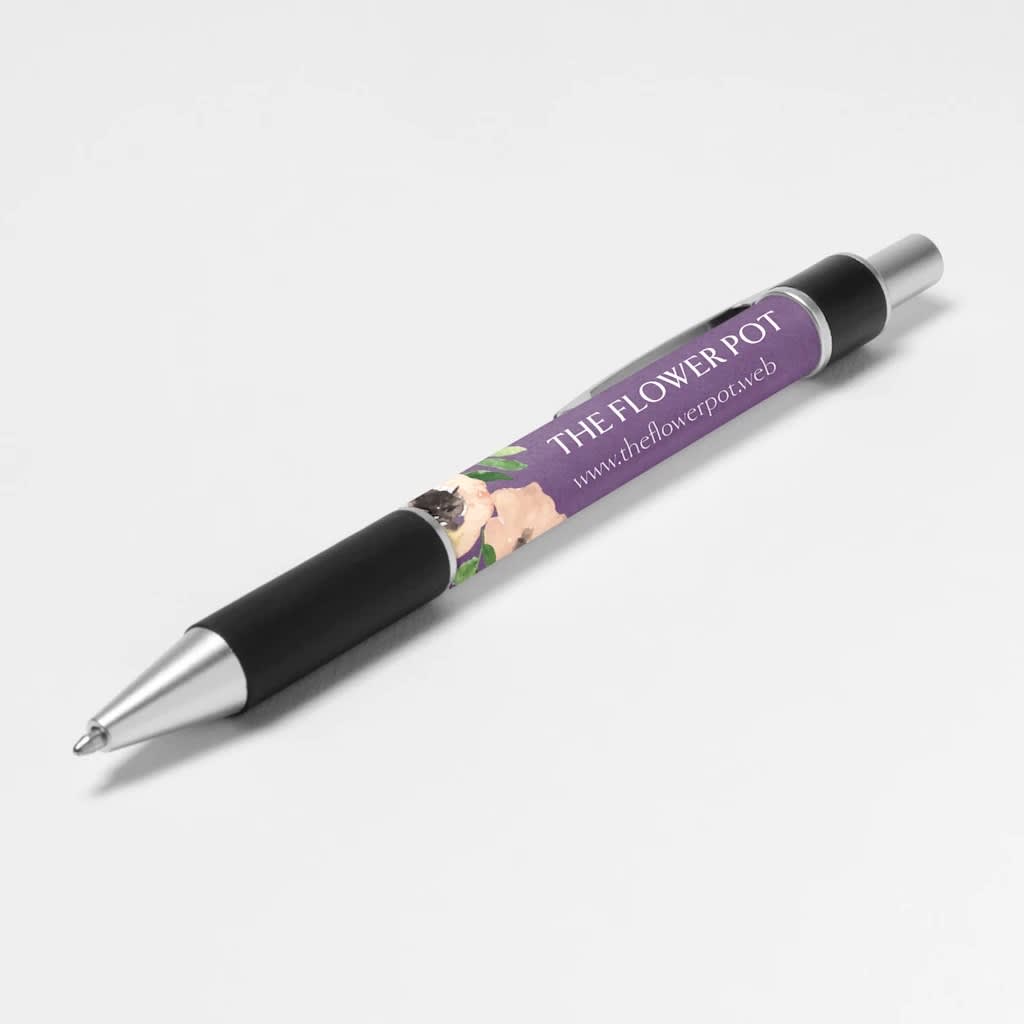 Branded purple and black pen with business name and website