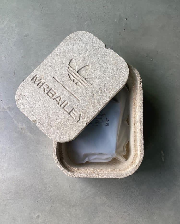 Frustration-free packaging made from agricultural waste and mycelium for the Mr. Bailey x adidas Originals collaboration.