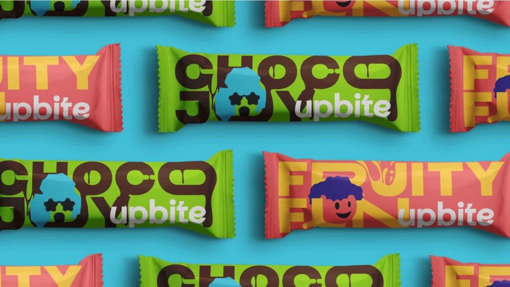 Maximalist packaging design for snack bars featuring bright contrasting colors, layered typography, playful illustrations and bold graphic elements arranged in a repeating pattern.