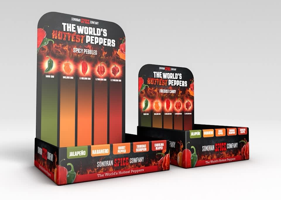 Retail-ready countertop display packaging for spicy pepper products featuring bold pepper-themed branding.