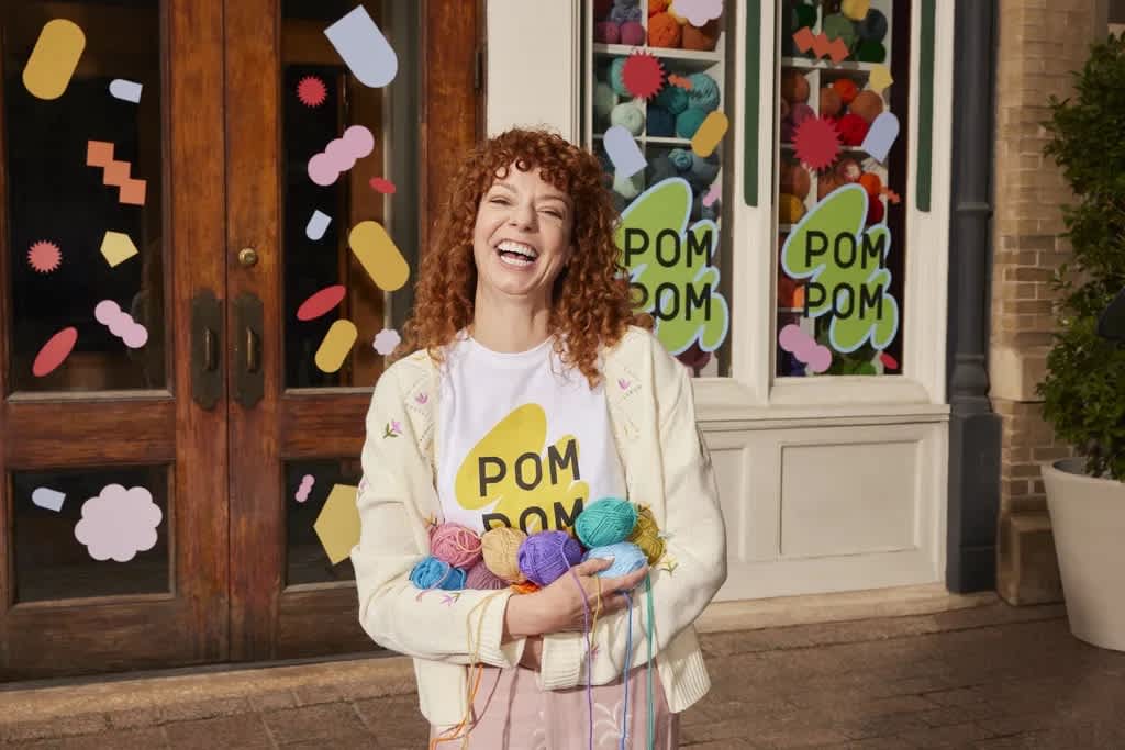 Small business owner of yarn shop opening up a store.