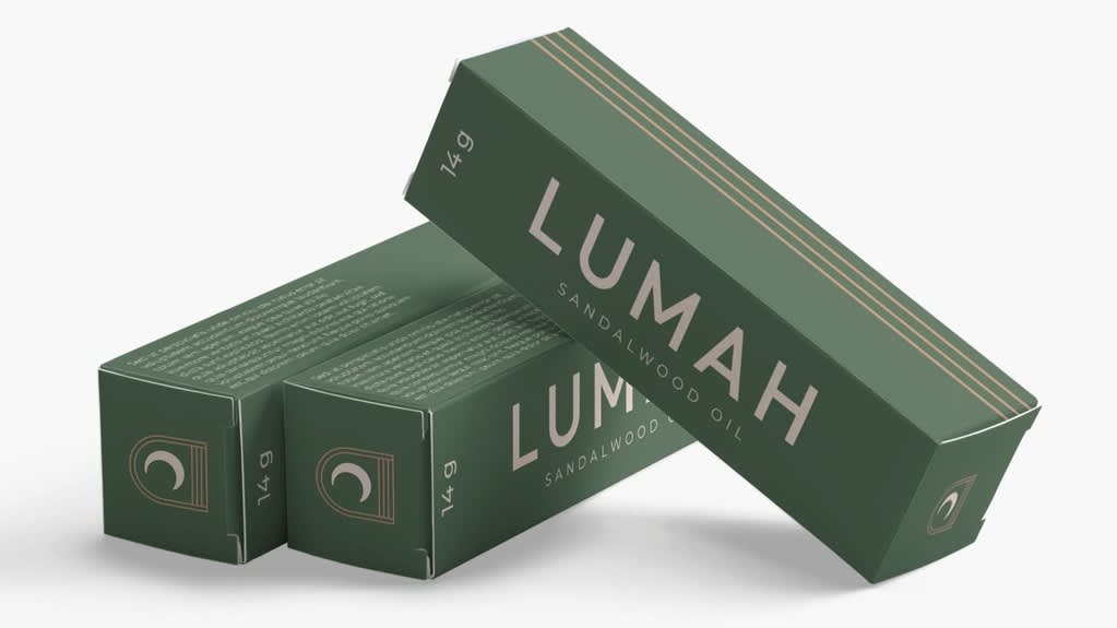 Alt text: Stack of 3 identical small rectangular product packages in simple green design with white font.