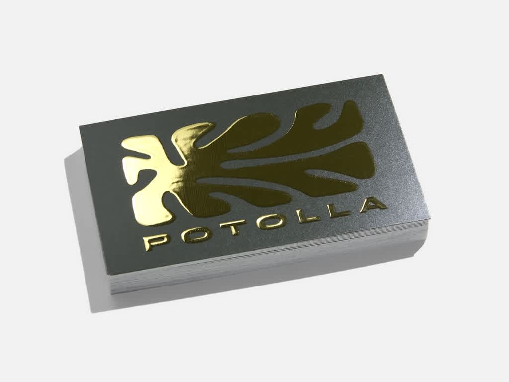 Black matte business card with raised high gloss organic shape gold logo with business name “Potolla”.
