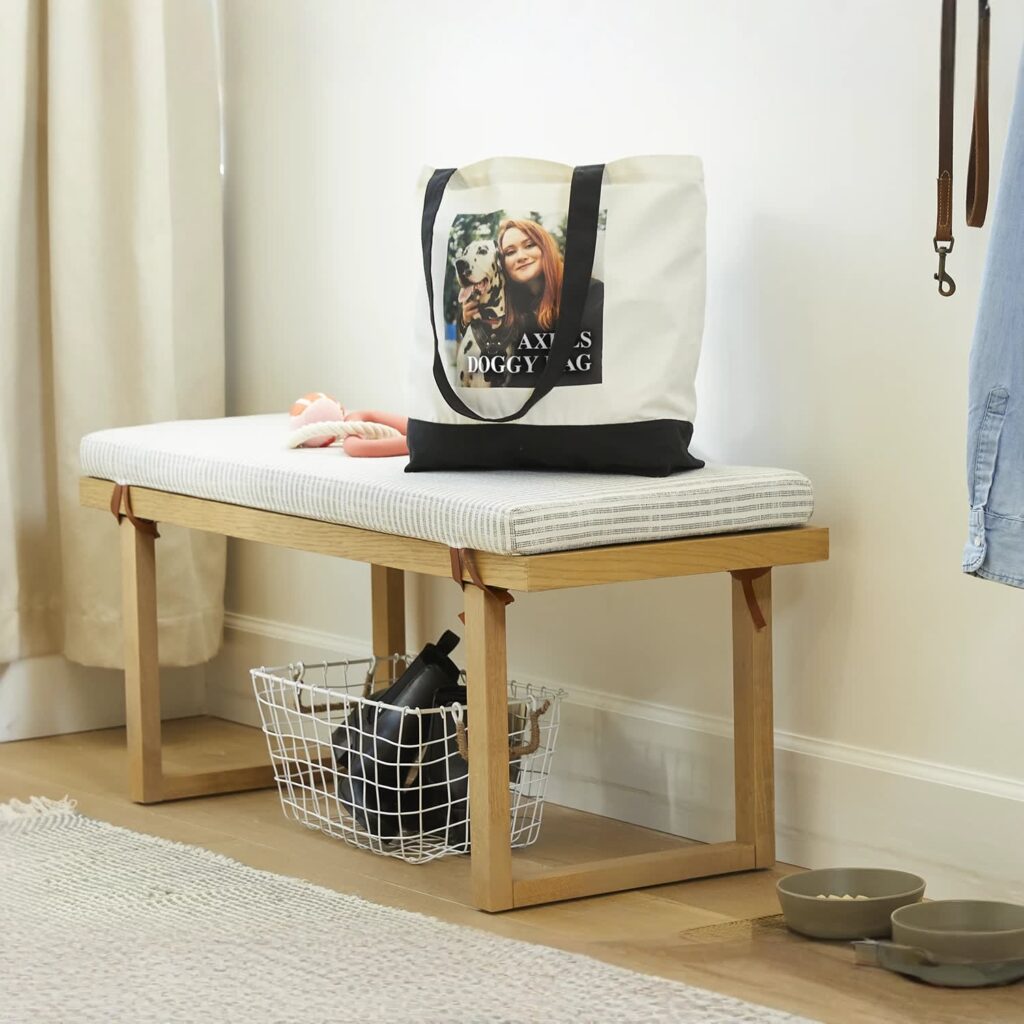 Custom white canvas tote bag with black strap and bottom panel and photo of woman and her dog.