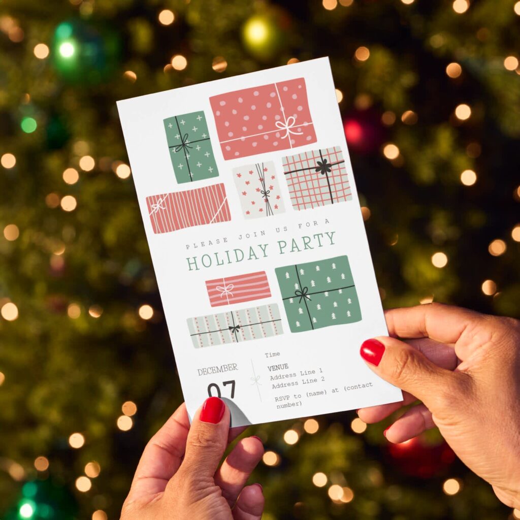 Holiday party invitation postcard featuring illustrated gift boxes held in front of a Christmas tree.