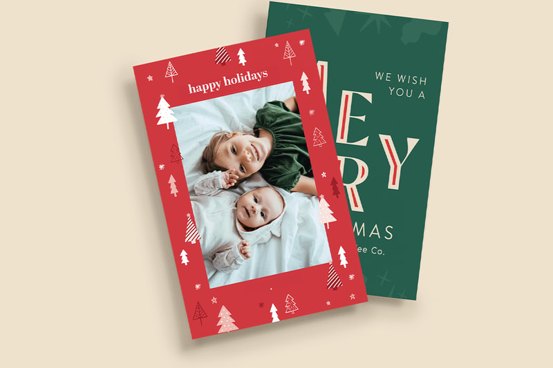 A personal Christmas card with a photo of two kids and a message &ldquo;happy holidays&rdquo;