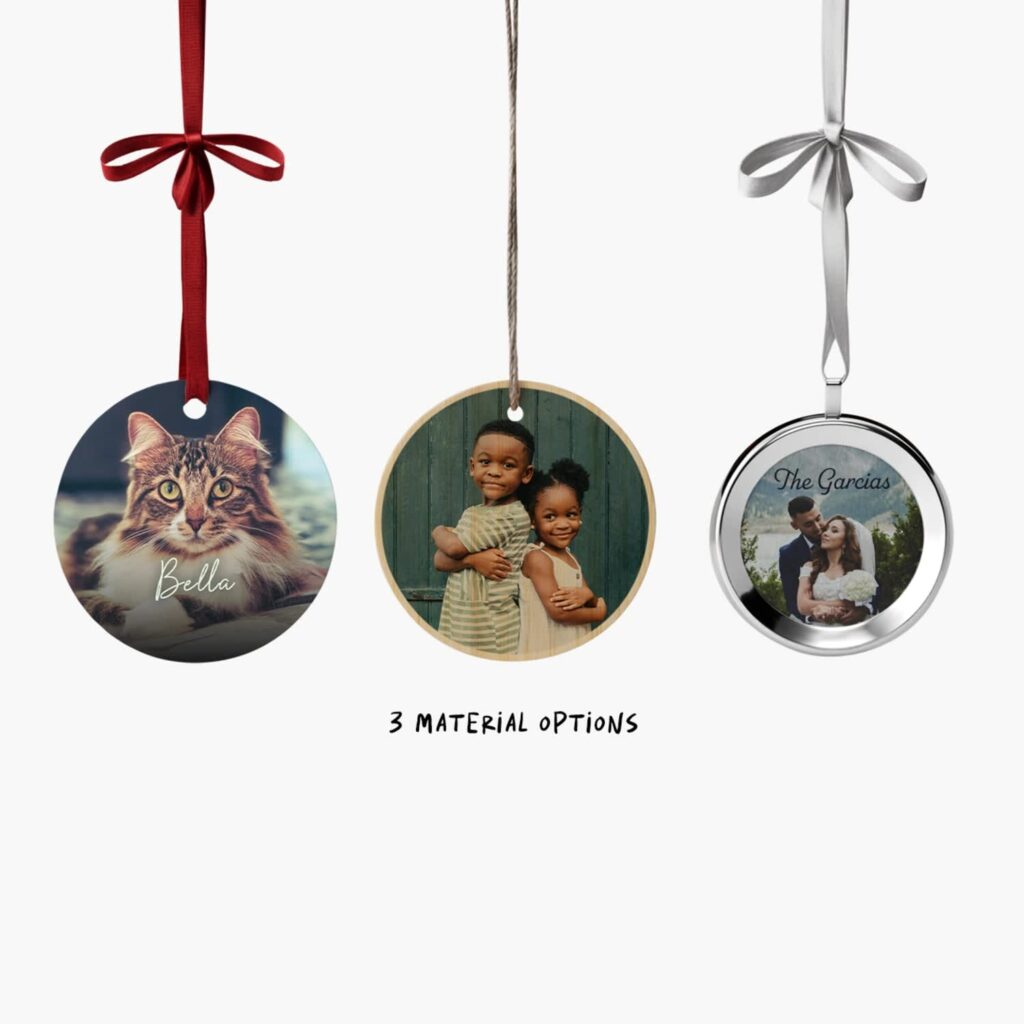Set of three custom photo Christmas decorations in 3 material options of bamboo, metal and framed metal and images of a cat, two children and a couple embracing.
