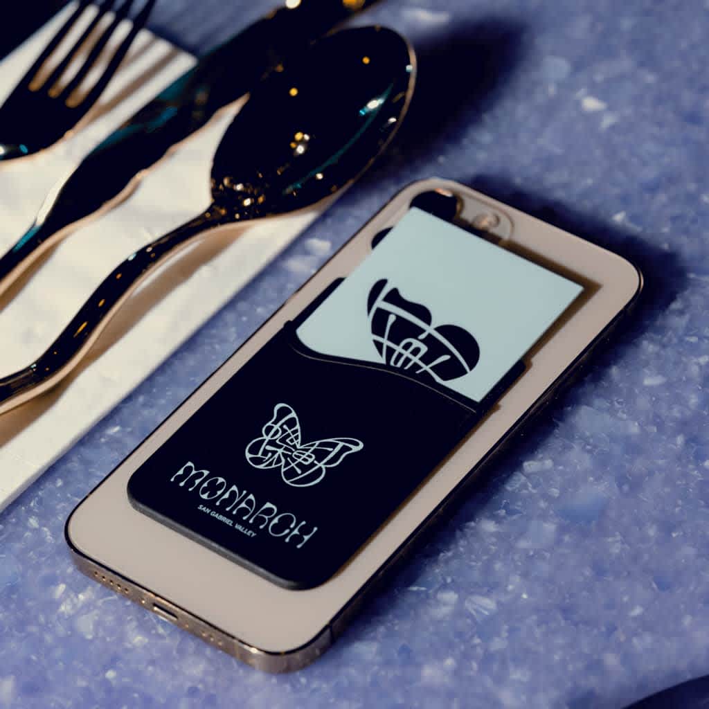 Monarch phone wallet promotional merch with beautiful butterfly logo.