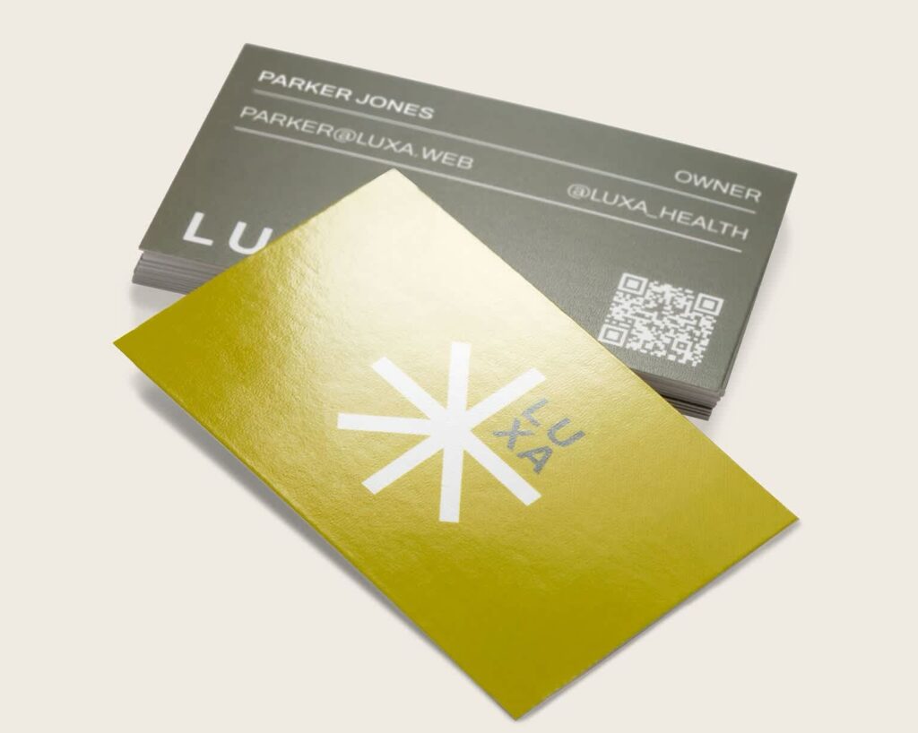 Gray and bright yellow business cards showing how contrasting business card colors create a bold, modern design.