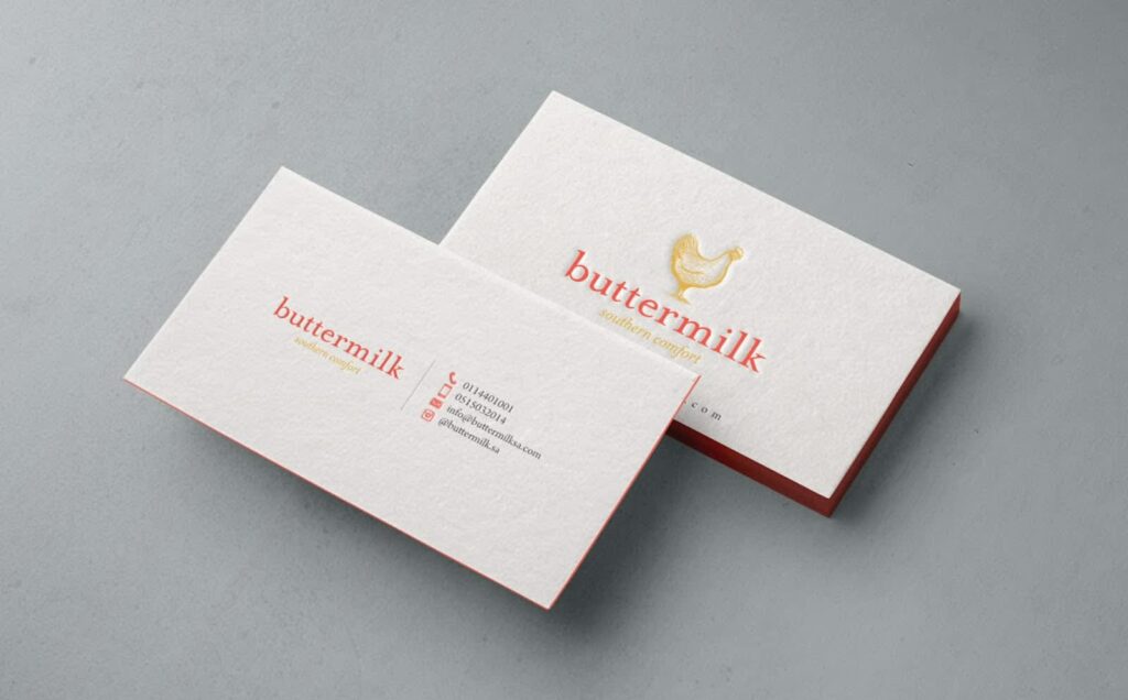 Simple business card design with an embossed illustration of a chicken with the text.
