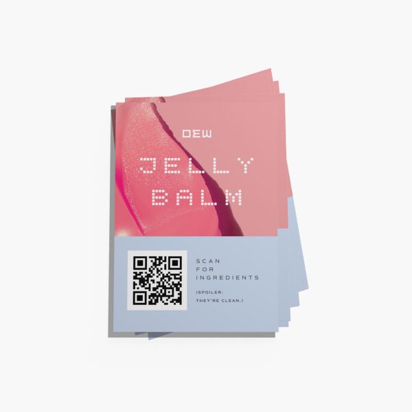 Stack of pink DEW Beauty Belly Balm custom packaging inserts cards featuring a QR code inviting customers to scan for product ingredients.