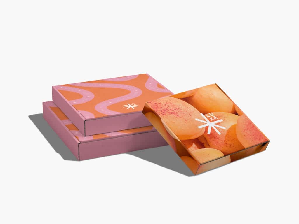 Orange and pink cardboard boxes branded packaging.