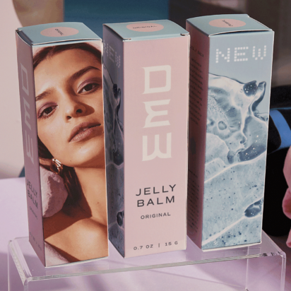 pastel-colored box packaging with female model's face pictured
