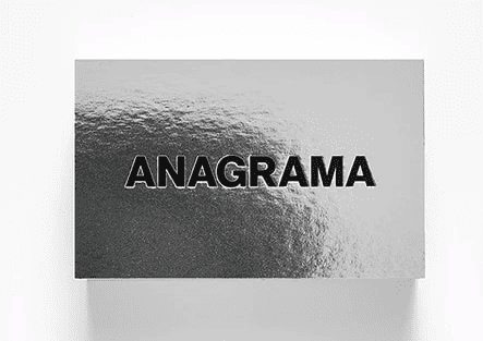 Silver metallic business card with embossed text