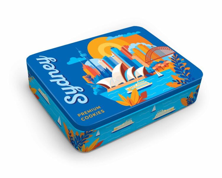 Blue metal cookie tin with illustrated city skyline and premium cookies branding]