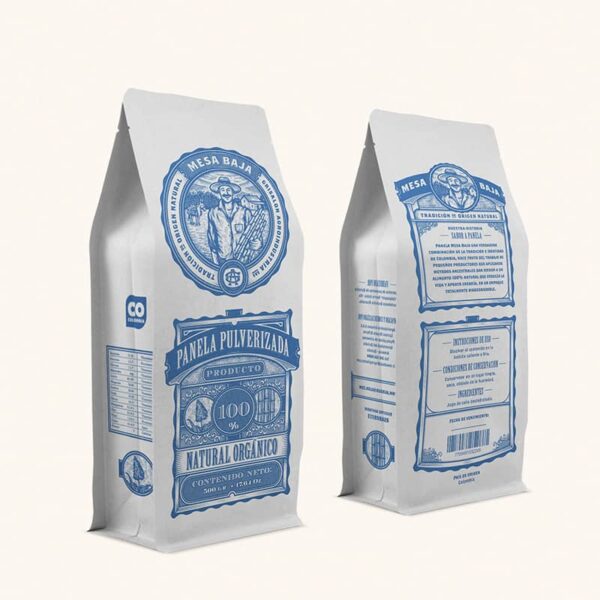 White paper bags for organic panela featuring intricate engraved-style farmer portraits, ornate borders and classic serif typography&mdash;an example of the Heritage Etch packaging trend 2026