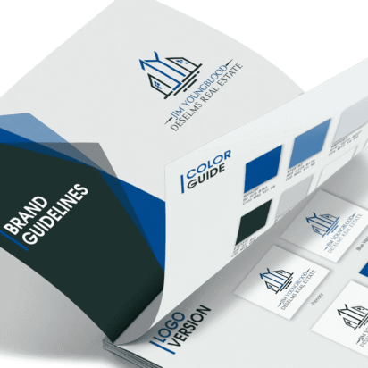 Open brand guidelines booklet showing color palette, logo versions and visual identity elements for a real estate brand