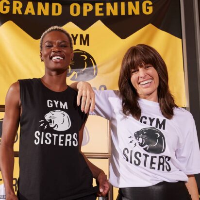 Loyal gym customers in branded T-shirts as an example of brand equity
